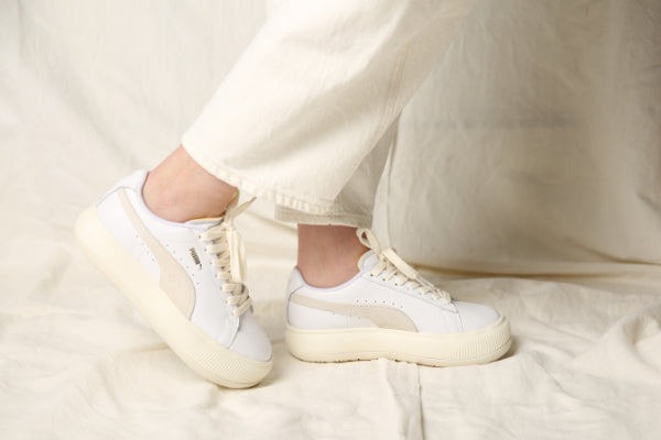 Pair of White Puma Suede trainers