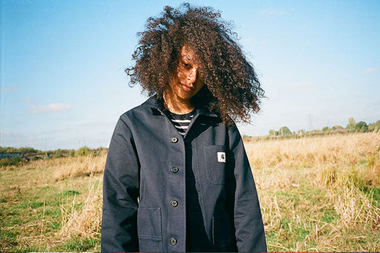 Woman on Walthamstow Marshes wearing a Carhartt WIP Jacket