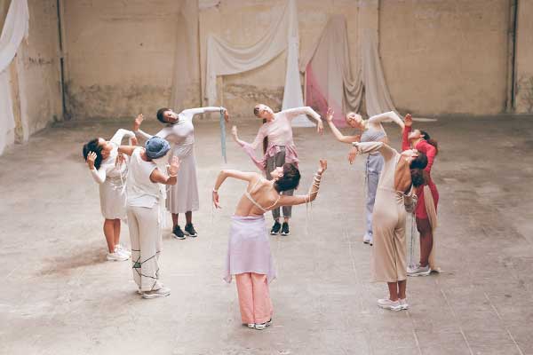 Circle of Female dancers with Nike Air Max Trainers